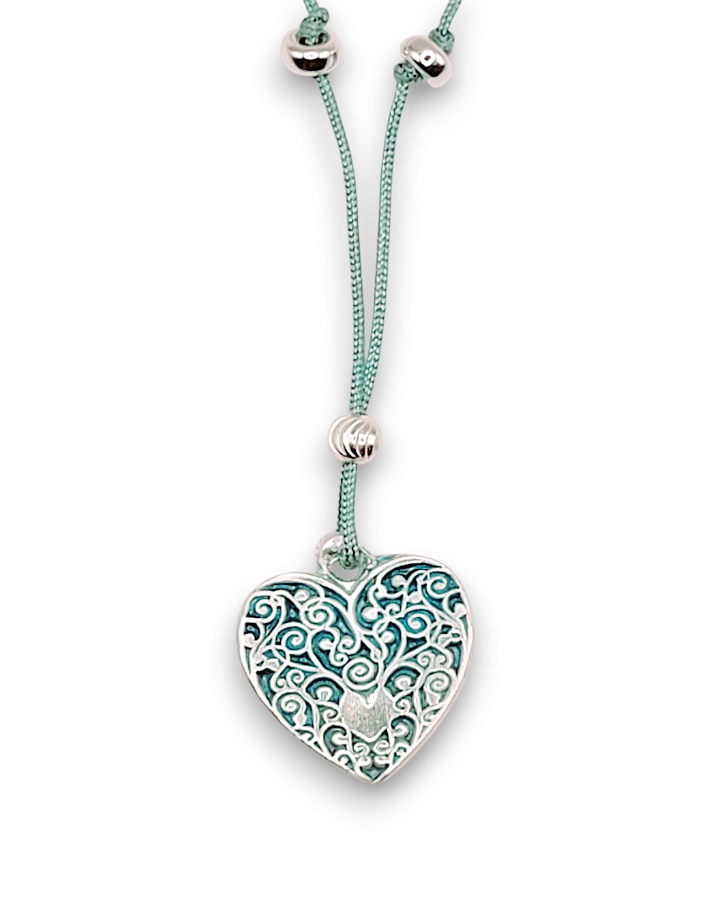 petit pendentif en émail sur argent fin champelevé et émaux bleus. Bijou artisanal réalisé à la main dans l'ateiler maison calub les émaux du Luberon