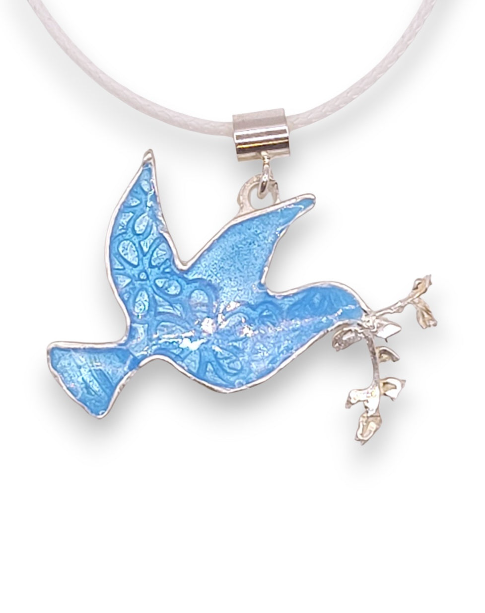 Pendentif  arisanal basse-taille en émail sur argent fin colombe de la paix contemporain. Bijou artisanal réalisé à la main chez maison Calub les émaux du Luberon. Emaux translucides bleus